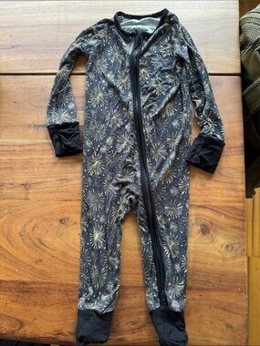 Little One Shop Black and Gold Fireworks One-Piece Footed Pajamas